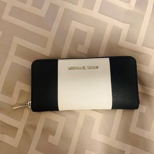 Michael Kors jet set zip around wallet.